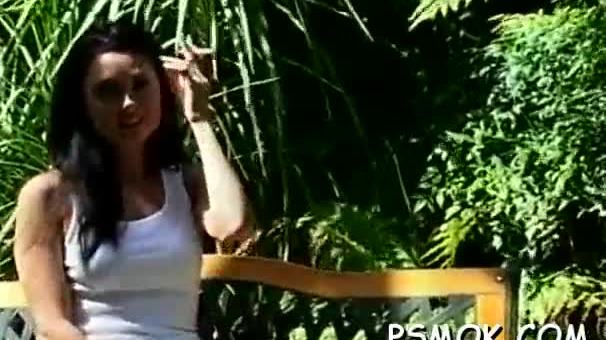 Pretty babe sucks a rod like a pro while smoking a cig